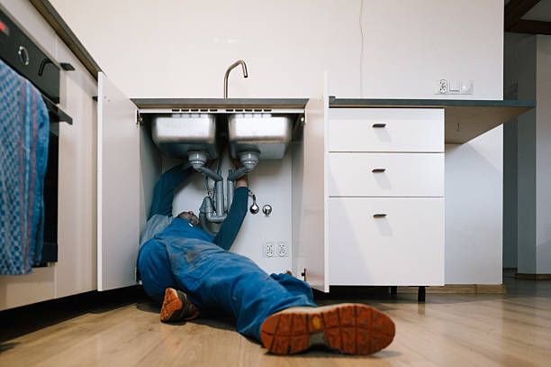 Professional Drain Cleaning technician working in Assumption, IL